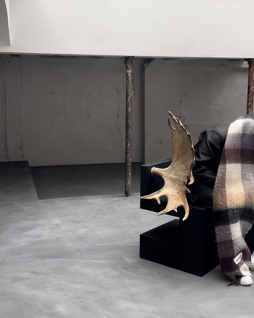 @issaozpinar sitting on Rick Owens & Michèle Lamy Tomb Stag Chair