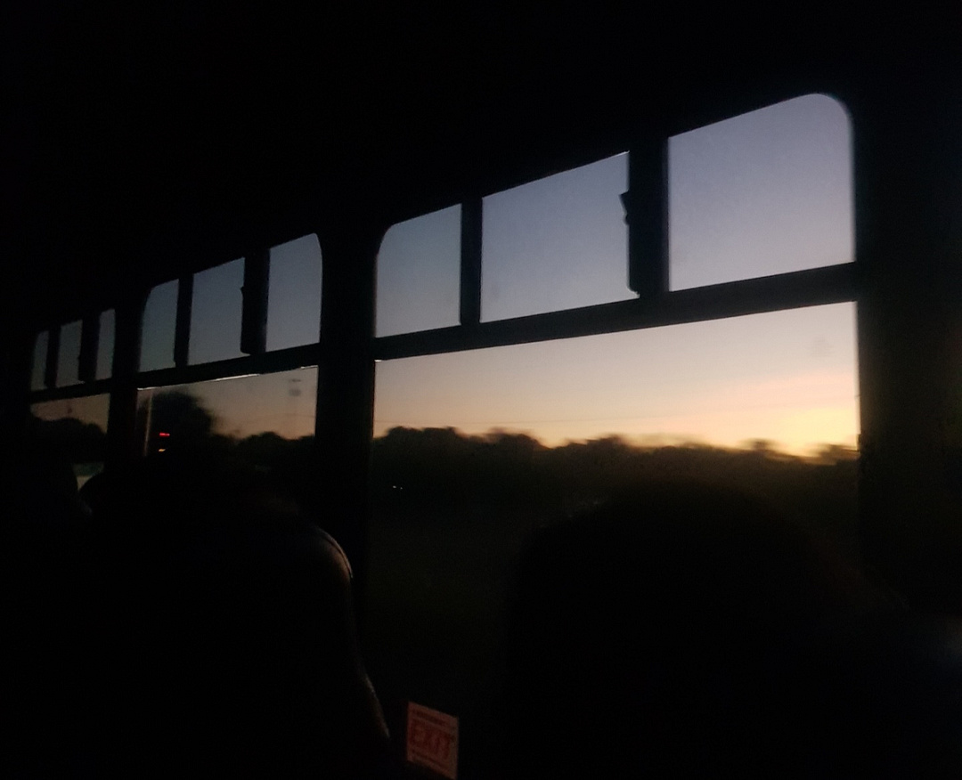 a bus trip at dawn