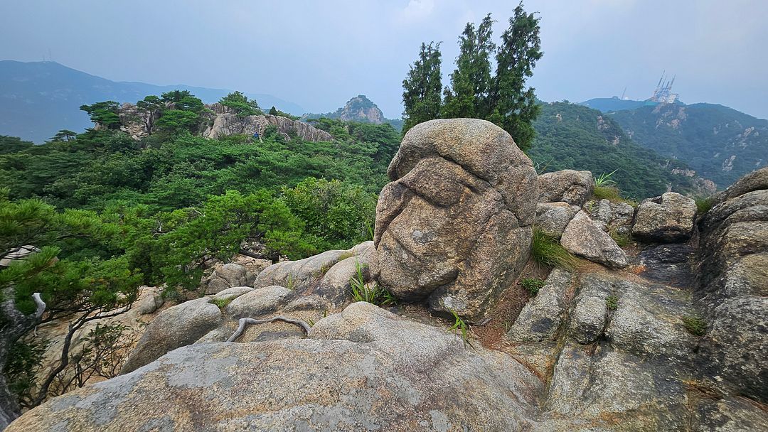 Gwanaksan Mountain Yukbong Ridge, my self-portrait rock painted by Picasso!  240824  Gwanaksan Mountain, Seoul, South Korea