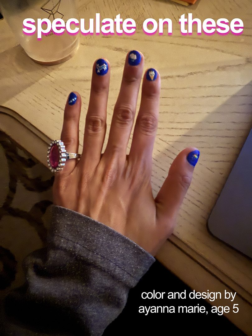 blue nails and a ring