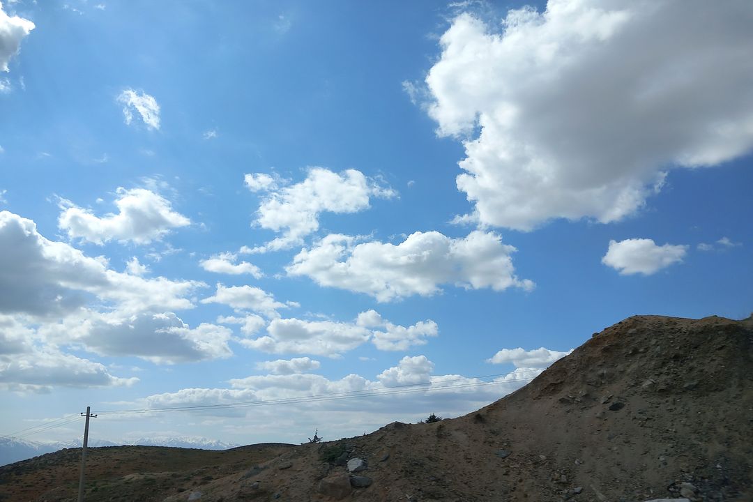 Symmetry of clouds and mountains