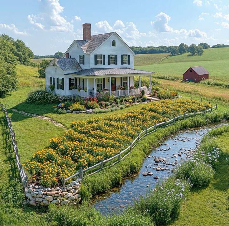 house in the mountains near a stream