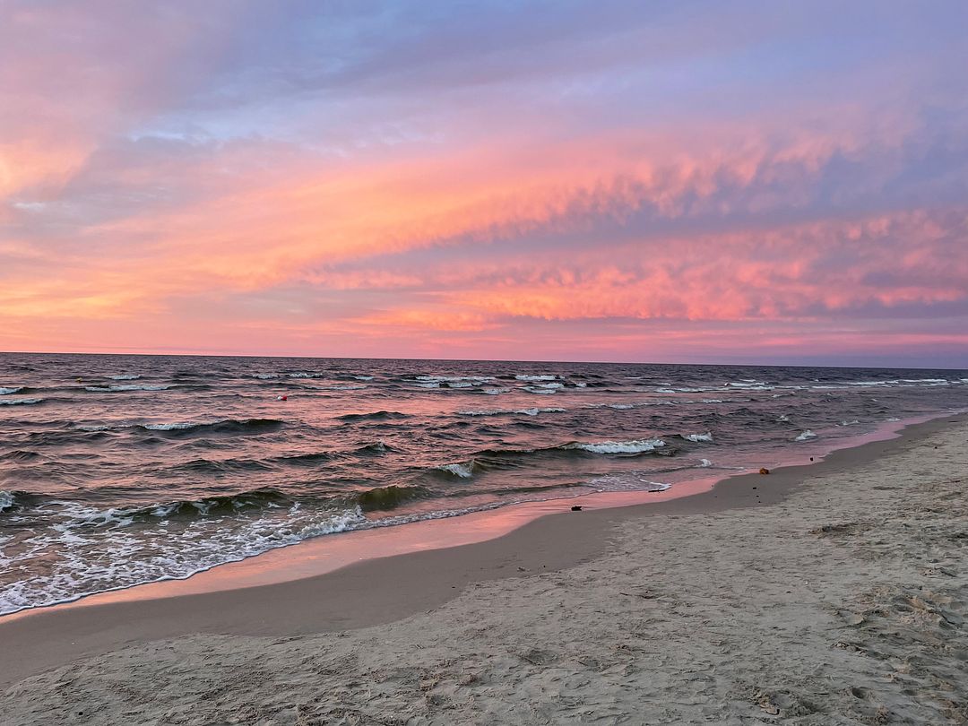 a sky by the seaside