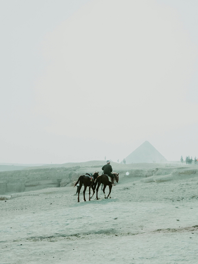 Man Riding a Horse at the Desert