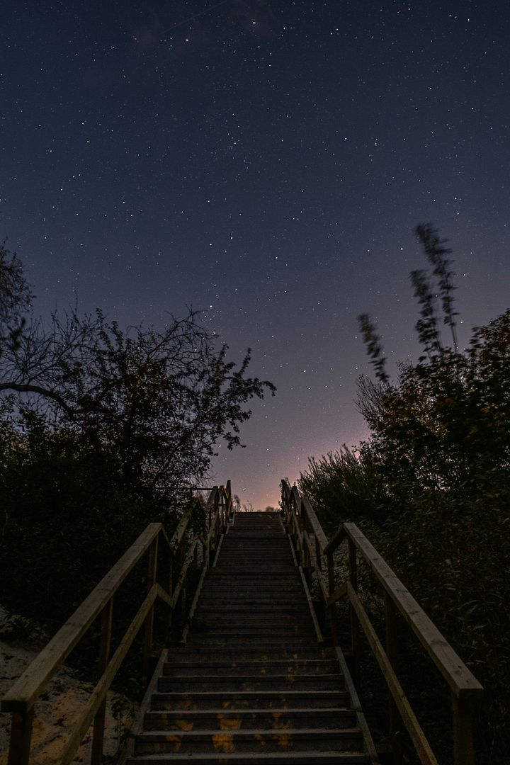 a set of stairs leading to the top of a hill