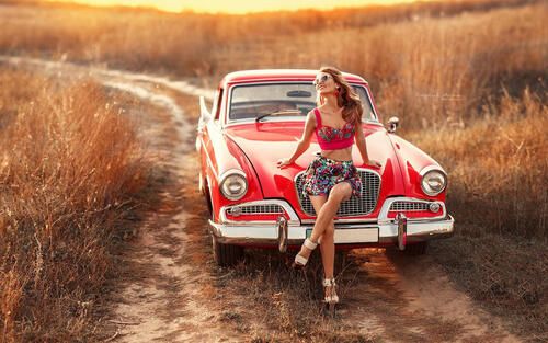 a retro car and a retro girl