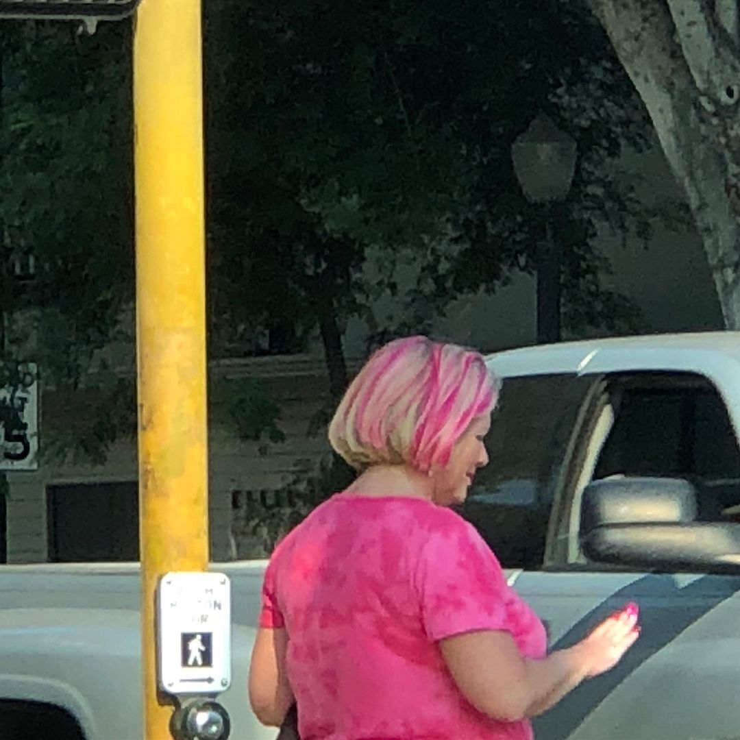 lady admiring her manicure