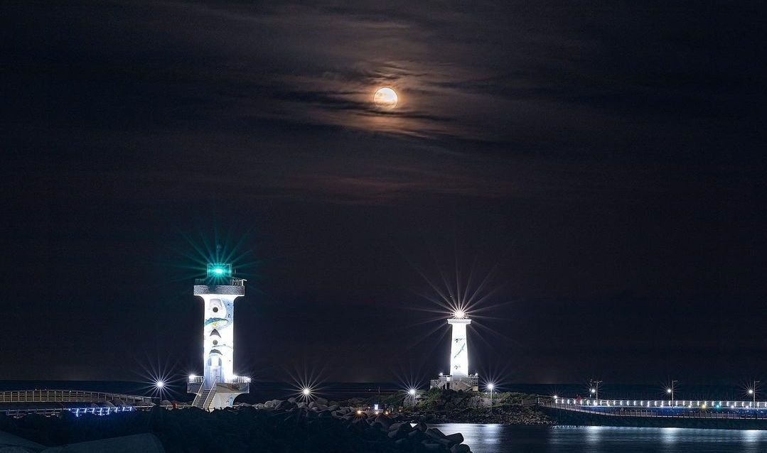 Lighthouse and Sea