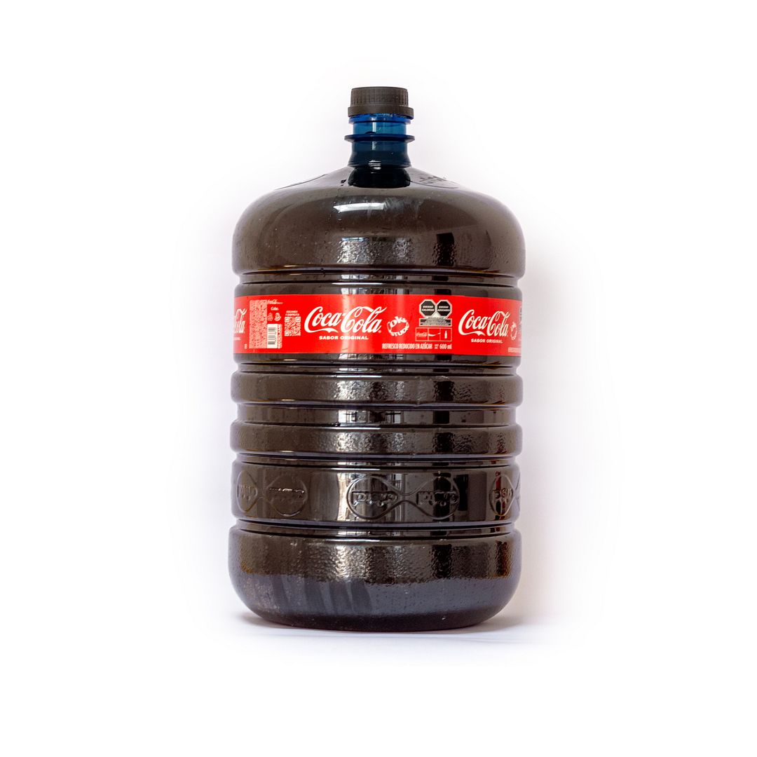 Title: CCC Year: 2023 Image: Mockup 20L bottle short fictional story exploring the influence of soft drinks on the peninsula of Yucatan.  Created during the residency in Merida, Mexico 2023