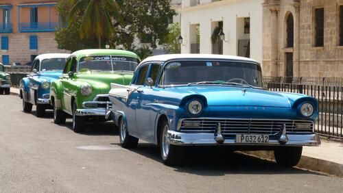 Chevrolet and Ford were popular car brands that were imported to Cuba before the Cuban Revolution of 1959.  They were delivered from the car factories to the southern ports of the United States, and from there to Havana.