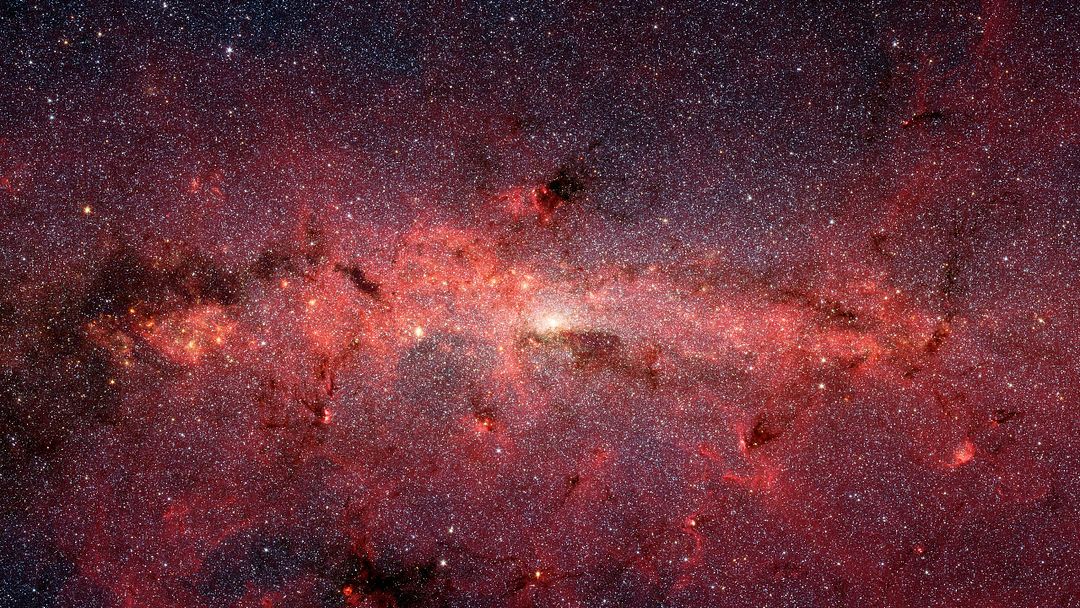 The Galactic Center in Infrared Light (Spitzer)