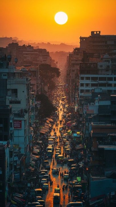 A golden sunset over a crowded road