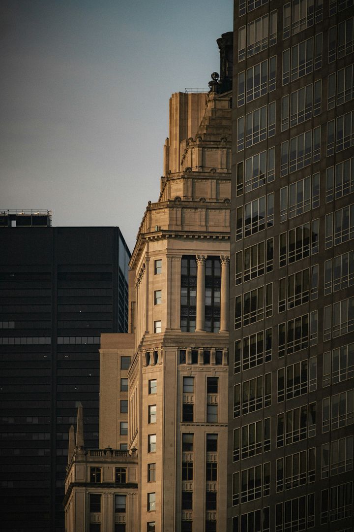 a very tall building in the middle of a city