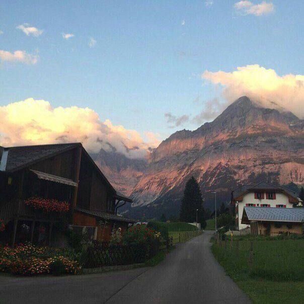 road through the city to the mountains