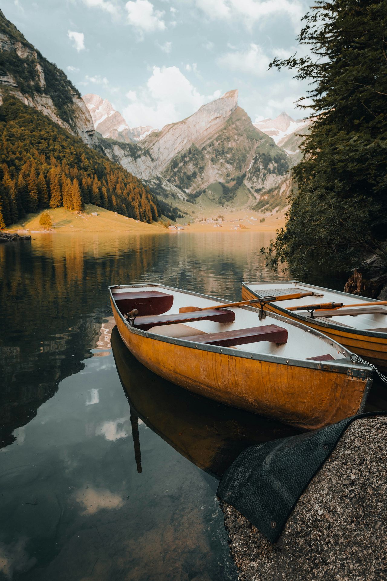 a group of boats on a lake